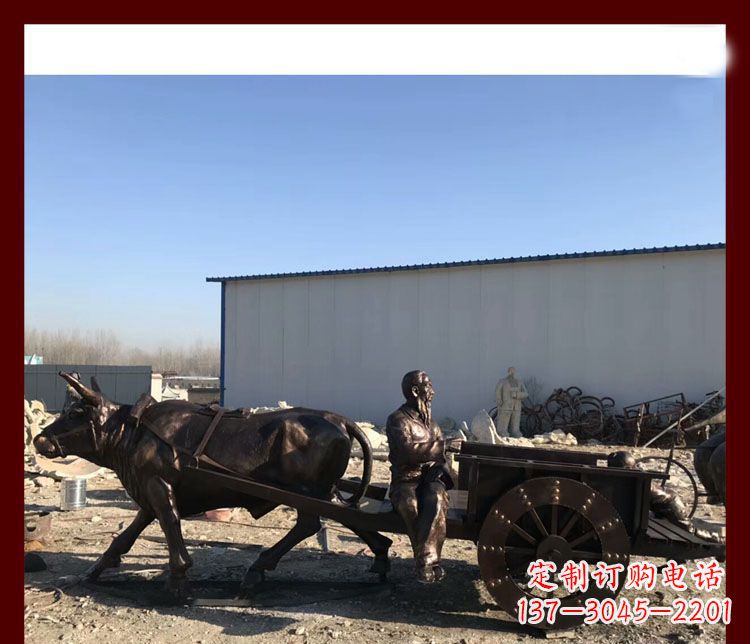 无锡赶牛车的祖孙俩铜雕