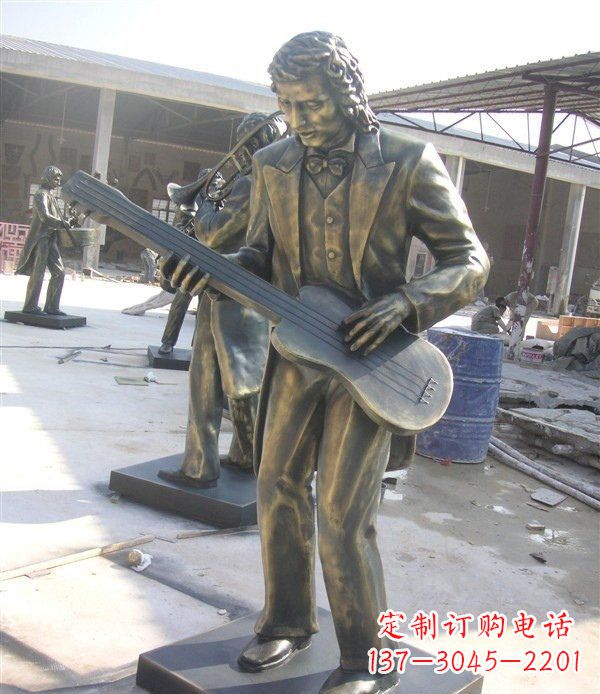 无锡西方人物铜吉他雕塑