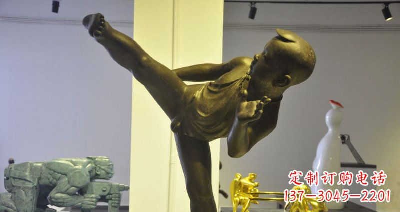 无锡领雕塑男孩练功夫铜雕