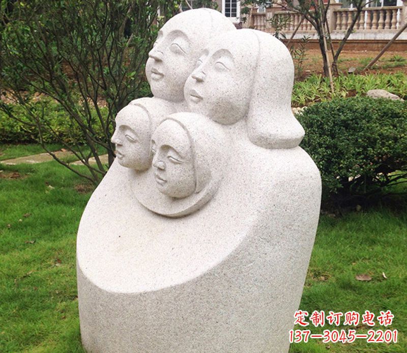 无锡公园母子人头像石雕