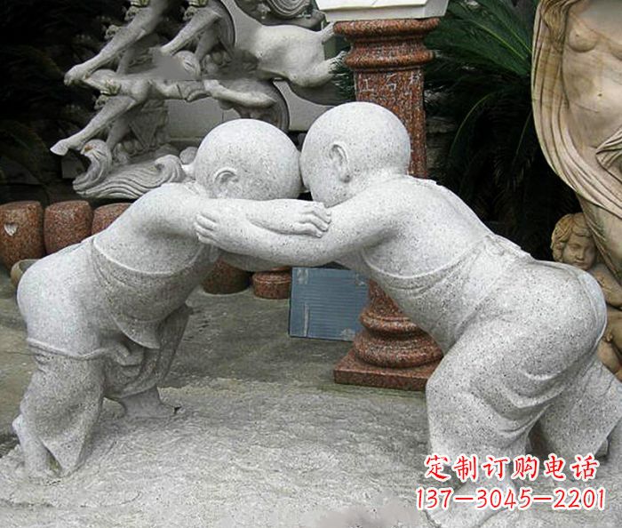 无锡可爱小孩摔跤石雕