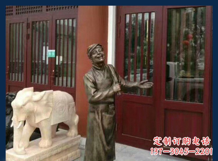 无锡铜雕店小二酒店迎宾人物雕塑