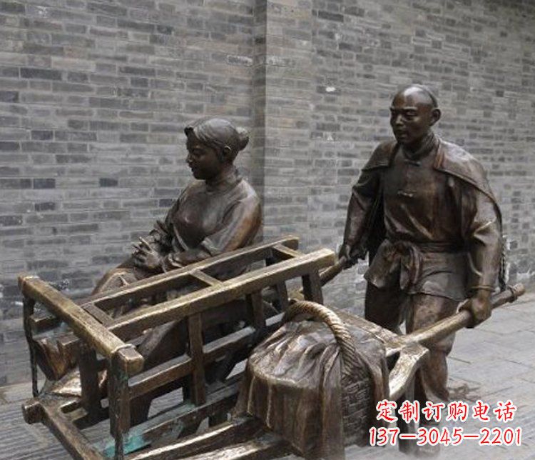 无锡推独轮车的人物铜雕