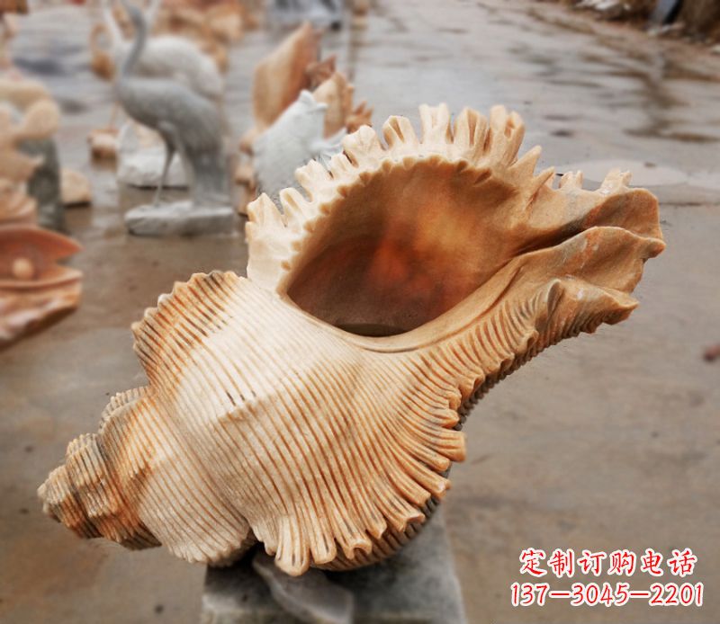 无锡晚霞红海螺石雕广场景观雕塑