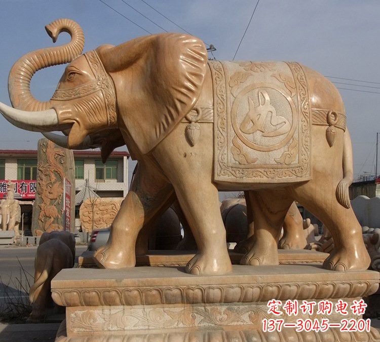 无锡晚霞红石雕如意大象
