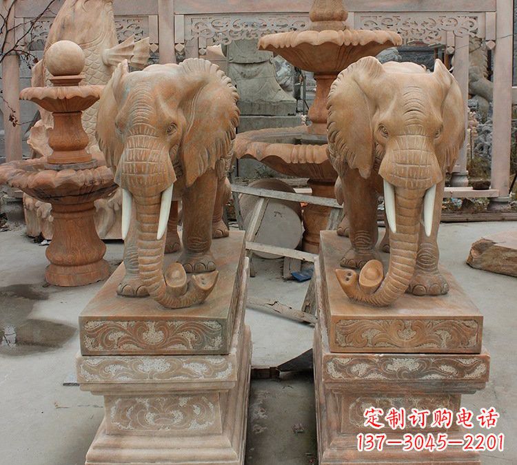无锡晚霞红石雕元宝大象