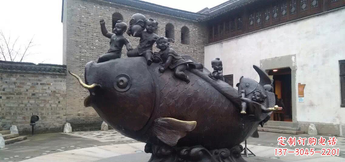 无锡小孩骑鱼铜雕