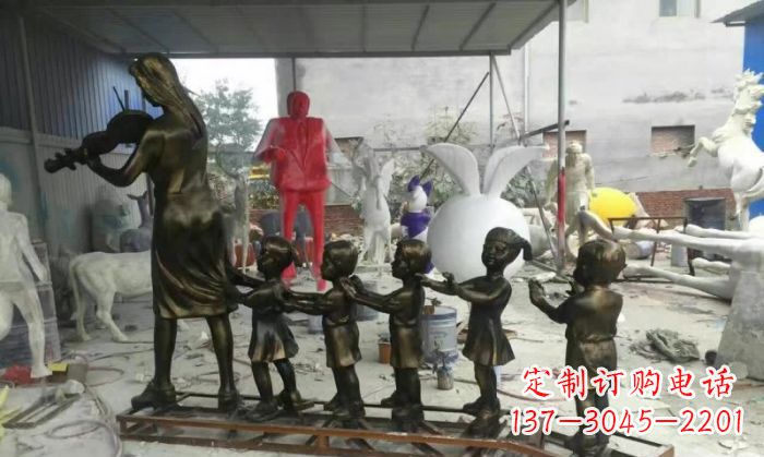 无锡校园老师和儿童铜雕