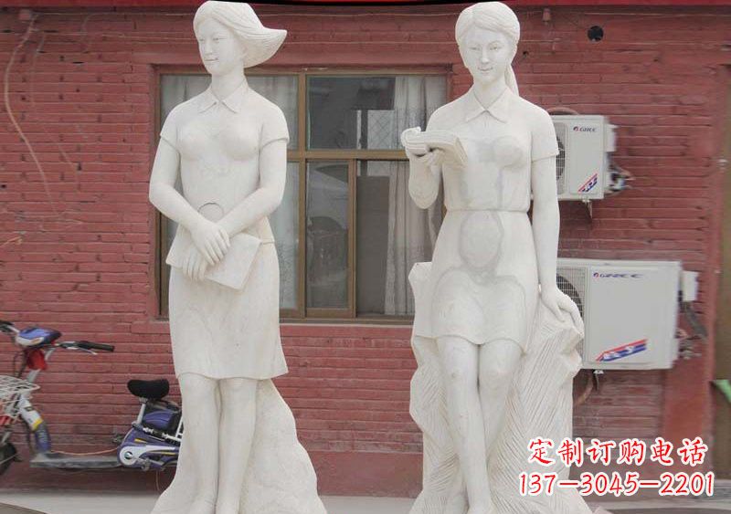 无锡校园拿书本的学生石雕