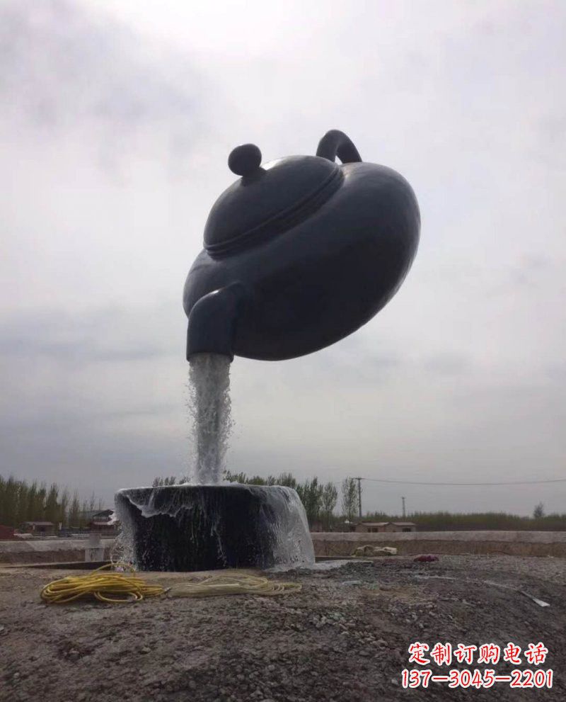无锡新疆流水的茶壶铜雕