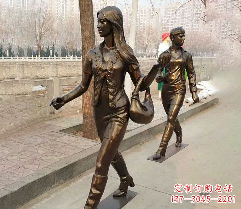 无锡行走的女人街边人物铜雕