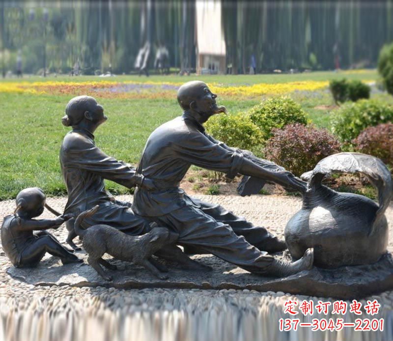 无锡祖孙三人拔萝卜铜雕 