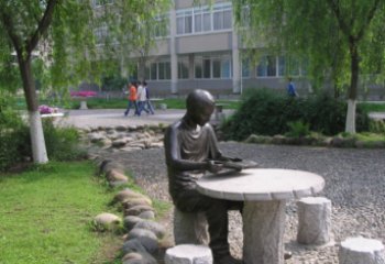 无锡坐石桌凳看书的学生铜雕