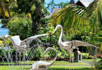 无锡鹤雕塑-公园池塘不锈钢镜面抽象喷泉中的鹤雕塑