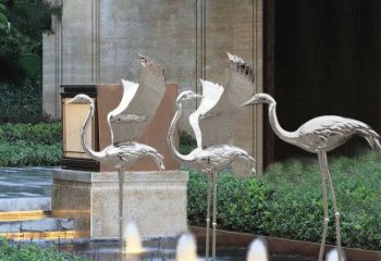 无锡鹤雕塑-公园不锈钢镜面喷泉中的鹤雕塑